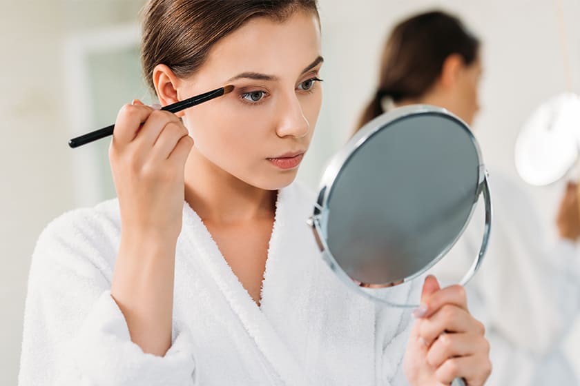 5 - Girl With eye makeup brush