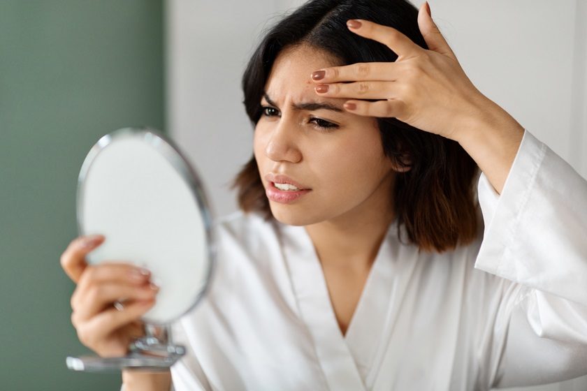 Women Loookin in mirror